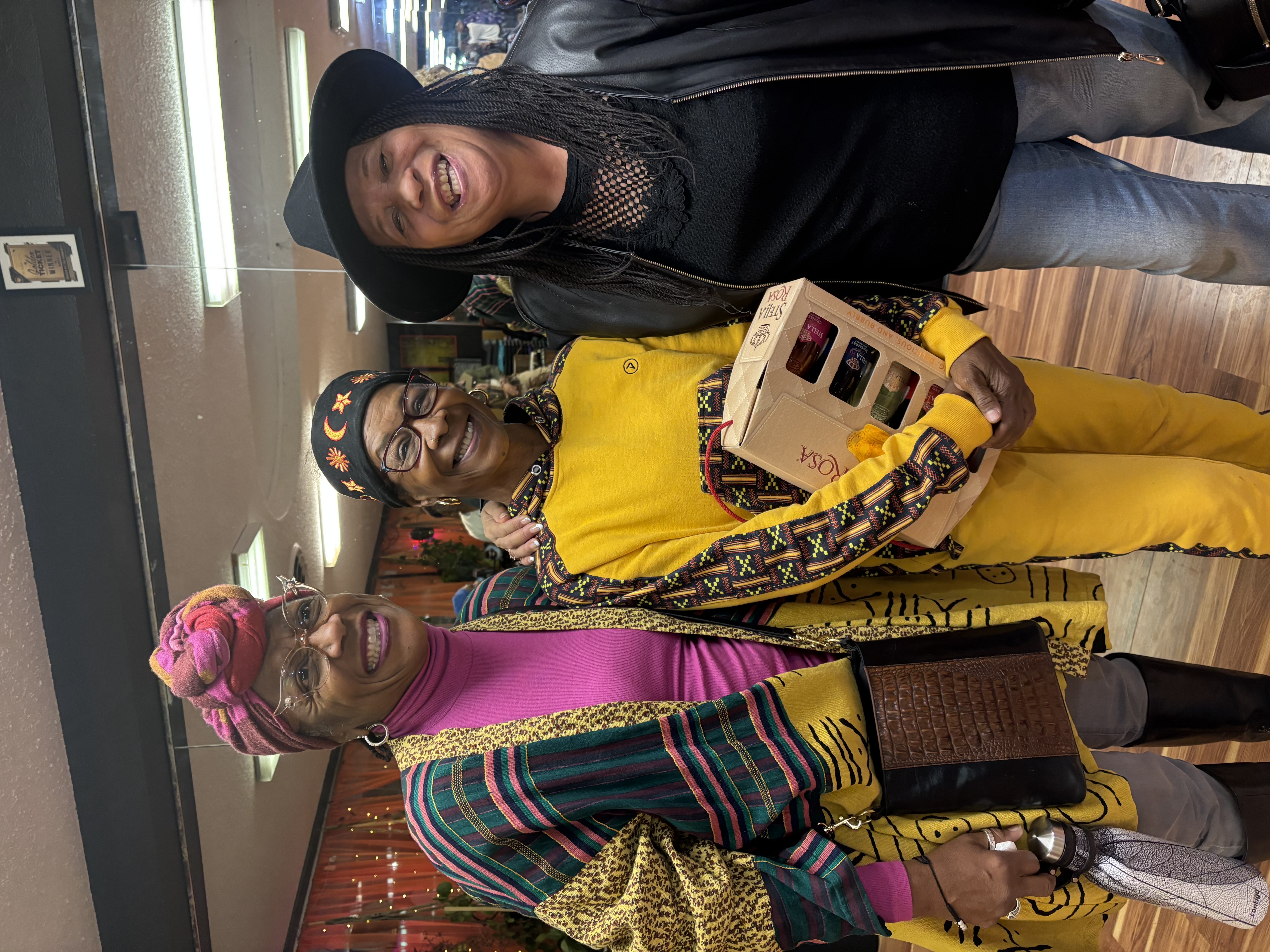 Community members in vibrant African attire